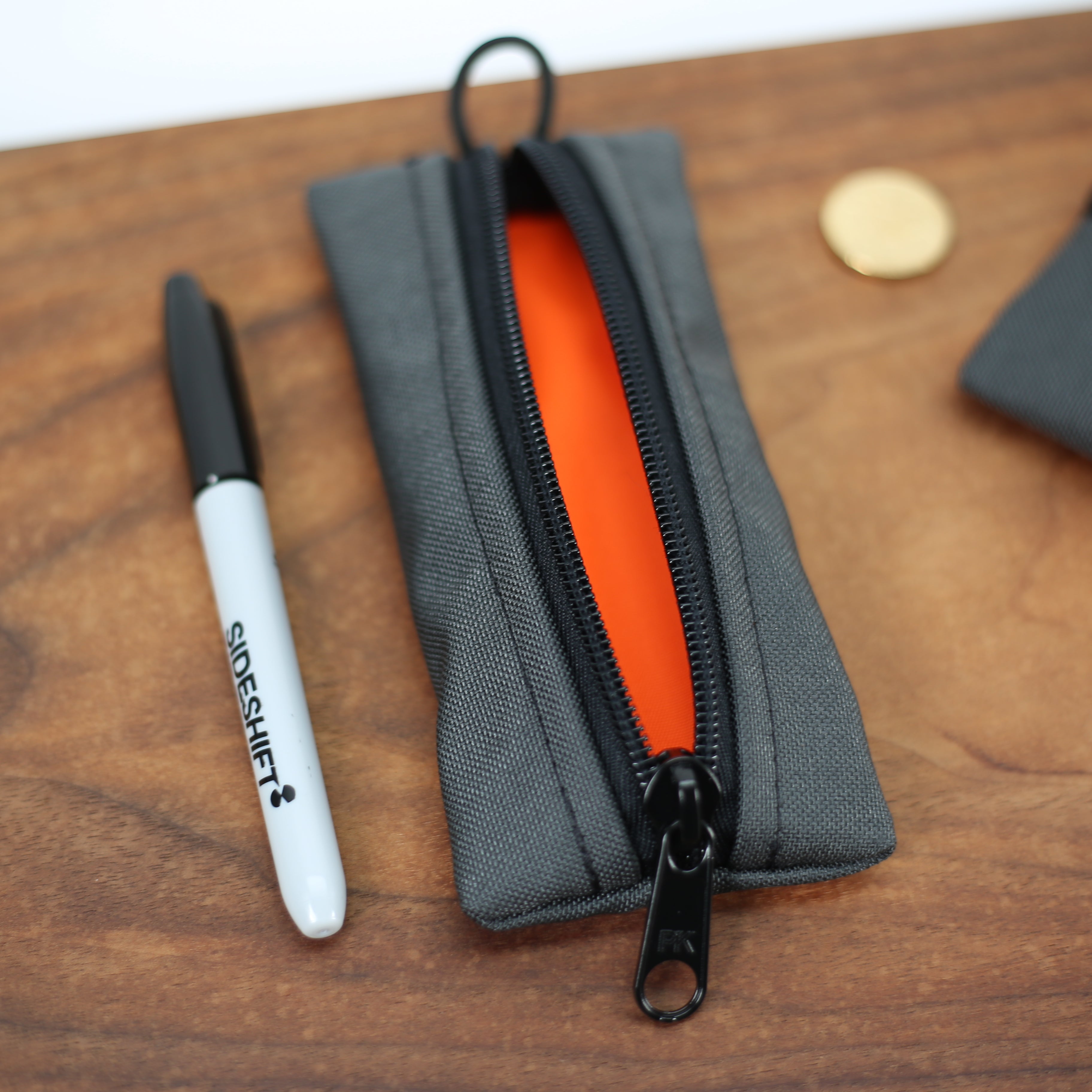 Sausage Roll Pouch in Grey/Orange